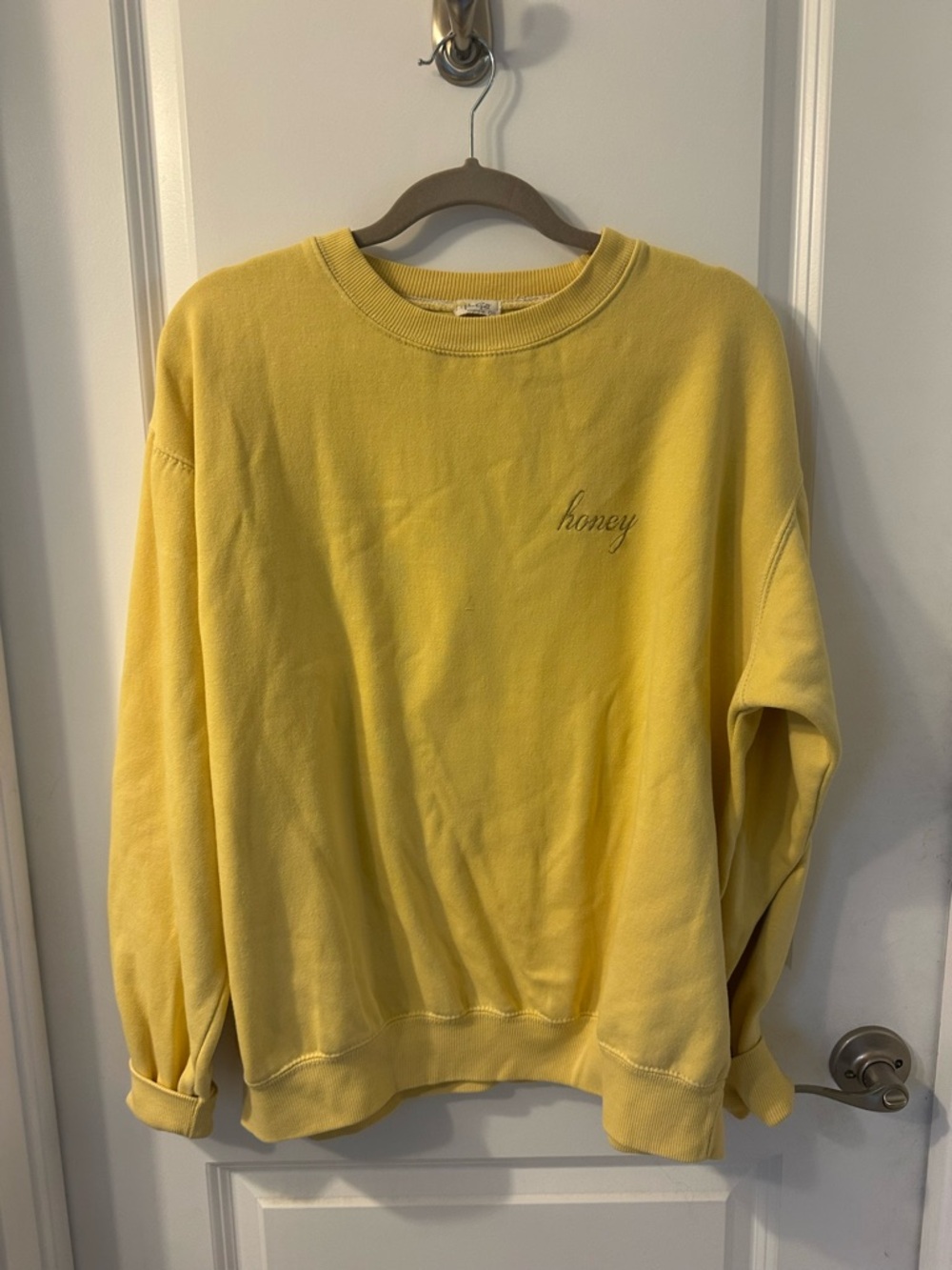 Brandy Melville yellow crewneck with subtle embroidered detail